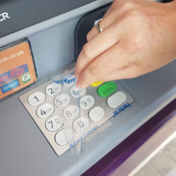 Packexe Infection Control System on a cash machine