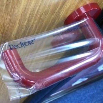 Packexe Infection Control System on a door handle